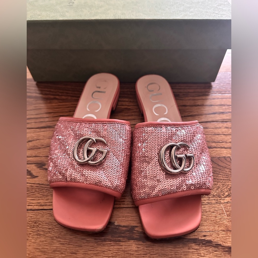 Gucci pink sparkle slides.